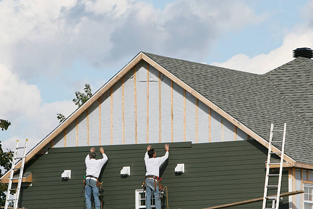 Professional Vinyl Siding technician working in Saint Thomas, PA